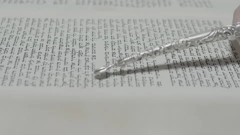 Reading a Torah scroll. side view. Close-up 스톡 동영상 142463143