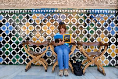 Reading a tourist guide Stock Photos