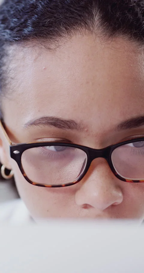 Reading, woman and computer with glasses at agency for editing publication, fact Stock Footage 329767578