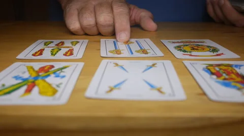 Reading your destiny fortune teller spanish cards Stock Footage 54015365