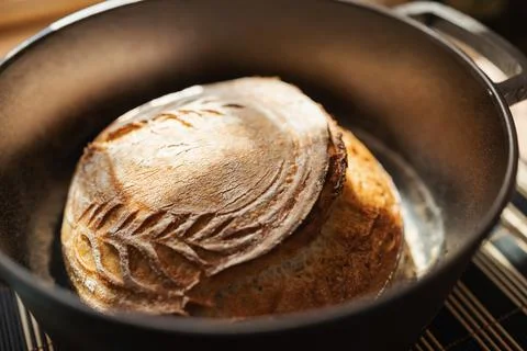 Ready baked bread in pan Stock Photos
