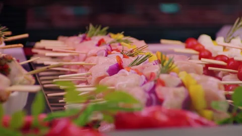 Ready to be grilled raw chicken meat on wooden skewers. Stock Footage 295273074