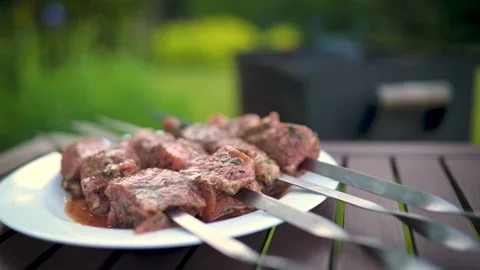Ready to be grilled raw pork meat kabobs on metal skewers. 스톡 동영상 198212476