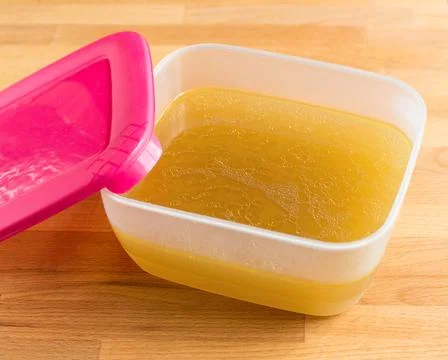 Ready broth in a container with a lid Stock Photos