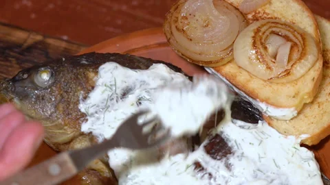 Ready carp on a plate with garnish Stock Footage 251876375