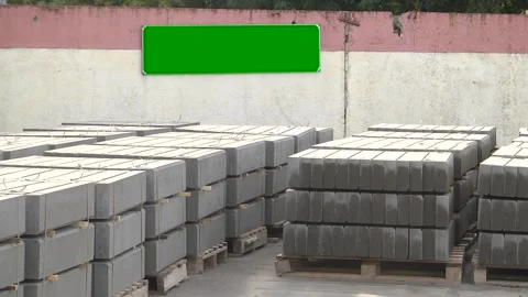 Ready curbs are laid on pallets and fastened with a packing tape. Stock Footage 106776038