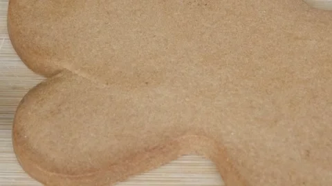 Ready to decorate large gingerbread cookie on wooden board. Some ingredients Stock Footage 341499638