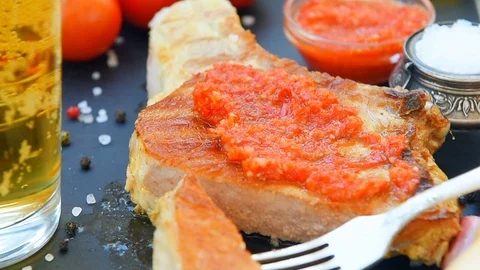 Ready to eat meat with spice, red sauce and beer Video stock 71414614