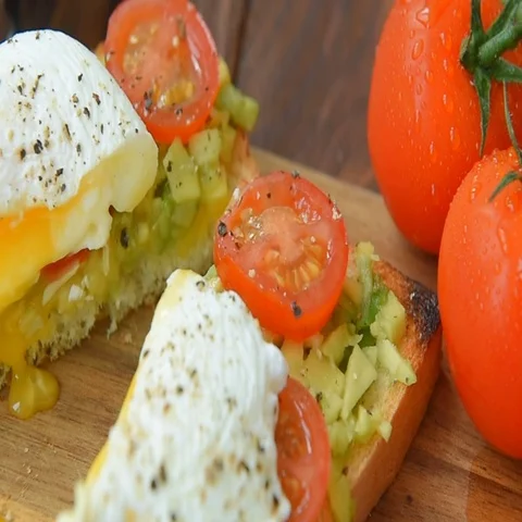 Ready to eat toast with poached egg and veggies Stock Footage 69601895