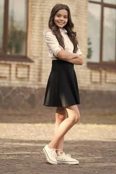 Ready to head off to class. Happy child wear uniform outdoors. Fashion look of 写真素材