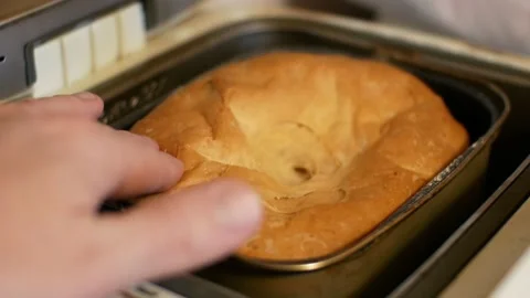 Ready-made bread baked in a household bread machine close-up  Stock Footage 133741009