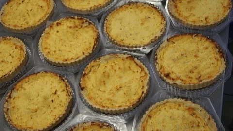 Ready-made cakes for fruit pie in food production Stock Footage 81013122
