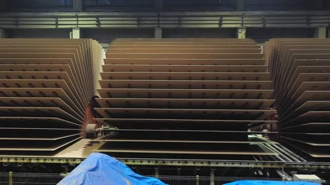 Ready-made chipboards are drying at the woodworking plant Stock Footage 169910060