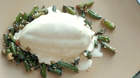 Ready-made dish from the chef. baked meat and green beans with sauce or Stock Footage 92940282