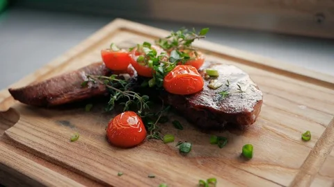 Ready-made dish of the restaurant from the chef. a piece of baked meat with Stock Footage 92938182