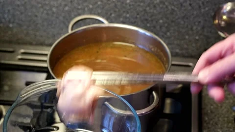 Ready-made pieces of chicken meat are removed with metal tongs Stock Footage 168411802
