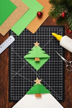 Ready-made simple crafts in the form of bookmarks for Christmas trees again.. Stock Photos