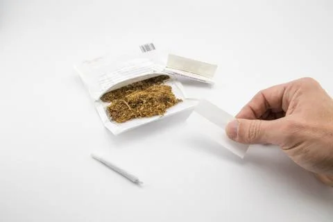 Ready to make another cigarette Stock Photos