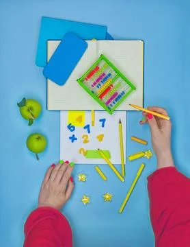 Ready for a math and arithmetic lesson with an abacus. Modern methods and app Stock Photos