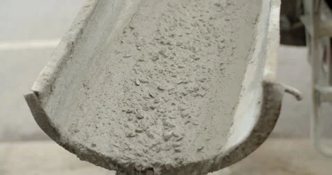 Ready-mixed cement flows down from the cement truck.Close up Cement. Stock Footage 289558148