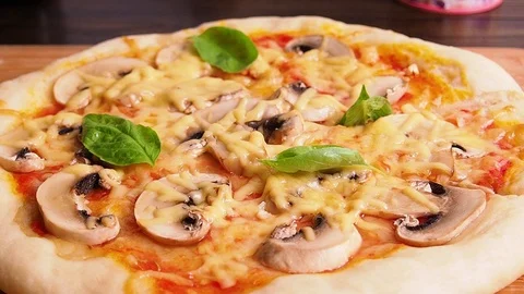 Ready pizza close-up on the Board, on the table. Stock Footage 114751567