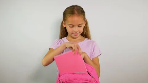 Ready for school. Portrait of a student preparing for study Stock Footage 114186547