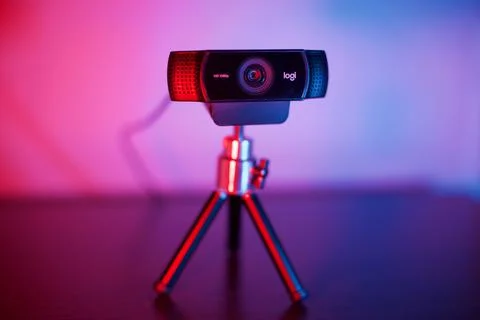 Ready to use Logitech webcam with tripod on desk. Stock Photos