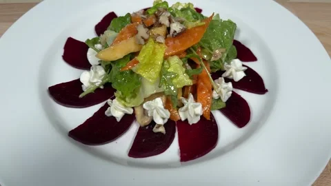 Ready vegetable salad on a white plate Stock Footage 306803635