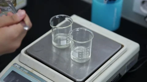The reagent was mixed with Beaker 03 Stock Footage 144839568