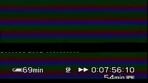 Real analog tape camcorder MiniDV VHS glitches distortion in signal Stock Footage 242764962