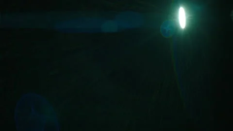 Real anamorphic lens flare overlay Stock Footage 147555439