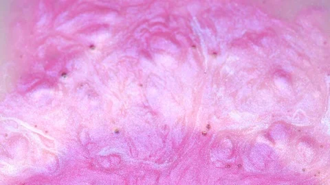 A real beautiful substance flows. Macro. Motion mixed colorful ink Stock Footage 107895942