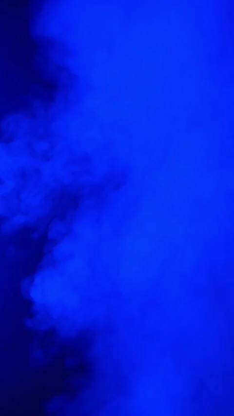 Real blue smoke rising dynamically from bottom to top forming an abstract Stock-Footage 313933408