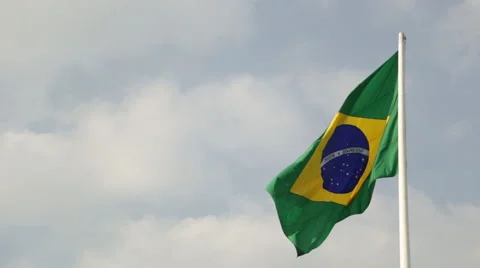 Real Brazil flag waving in the wind. Rio de Janeiro is about to host the olympic Stock Footage 54263370