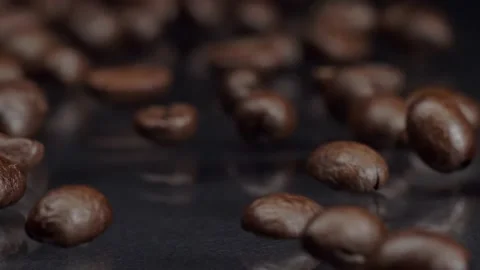 Real coffee. Super slow motion shot of premium fresh roasted brown coffee beans Stock Footage 150669386