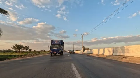 Real driving tour through the Cairo Fayoum Desert Road with calm highway scenery Stock-Footage 330082223