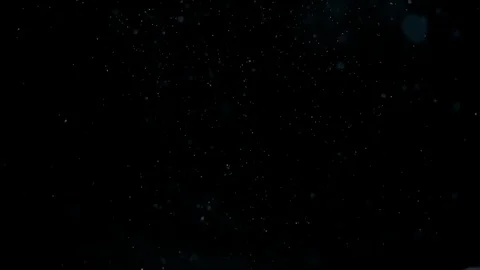 Real dust particles floating in the air, shallow focus, bokeh, isolated on black Stock Footage 70981537