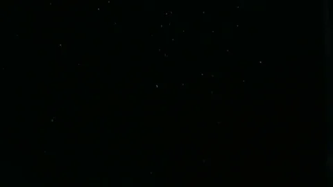 Real dust / snow particles floating down, isolated on black background Video stock 70980940