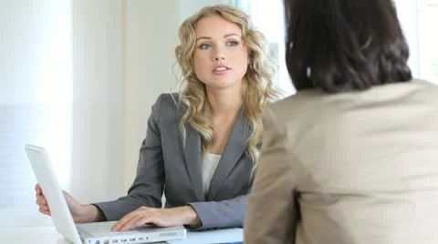 Real-estate agent with client in office Stock Footage 14825625