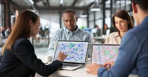 Real Estate Agent Developing Building Plots On Cadastre Map In Office. Fotos de archivo