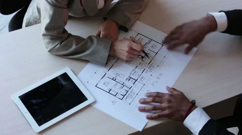 Real estate agent discussing with a client Stock Footage 42368283