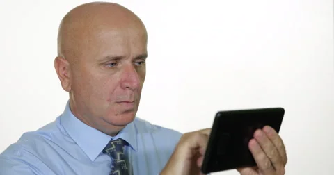 Real Estate Agent Using Internet Tablet Man Check Sales Market Financial Profit Video stock 54112246