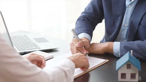 Real estate agents explain models Stock Footage 217506583