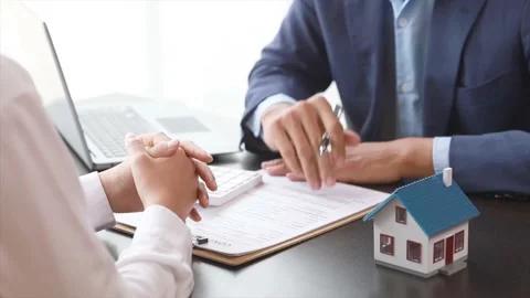 Real estate agents explain models Stock Footage 217506589