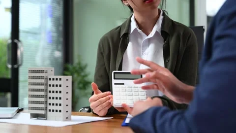 Real estate broker agent presenting and consult to customer to decision mak.. Stock Footage 312775233