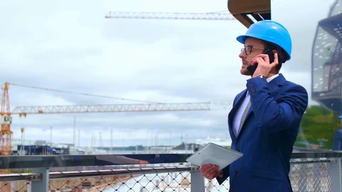 Real estate developer. New office construction. Confident business men or Stock Footage 112732346