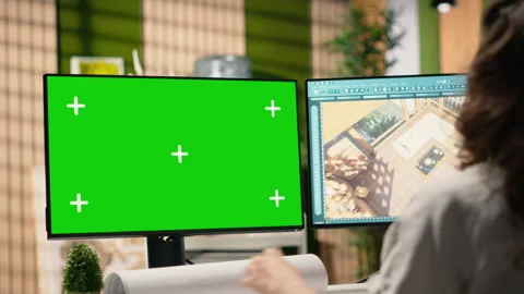 Real estate developer reviews project blueprints with chroma key Stock Footage 316642348