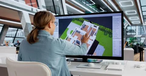 Real Estate Engineer Using 3D CAD Software For Interior Design. Stock Photos
