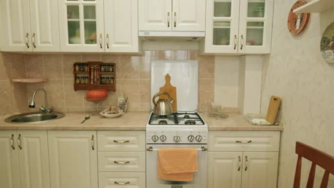 Real Estate. Interior Design Of The Kitchen White And Brown Cabinetry. Comfortab Stock Footage 304652245