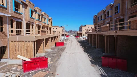 Real estate project construction site in America. Townhouses and Housing bu.. Video stock 237953483